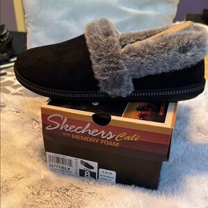 Skechers Black Slip Ons with Gray Faux Fur